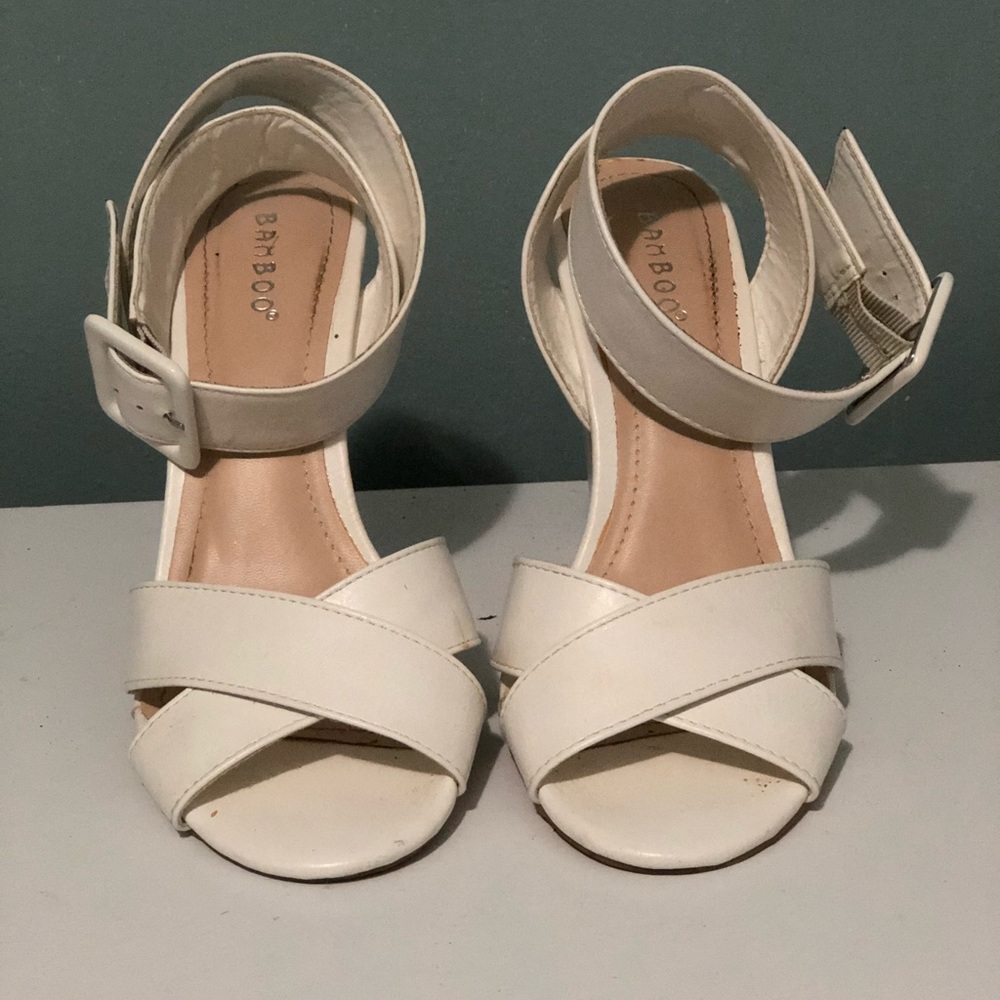 White faux leather heels. Heel is about  3”1/2’